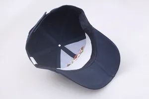 Detailed interior view of navy blue baseball cap showing seams and adjustable strap