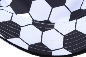 Reversible soccer pattern bucket hat with classic black and white pentagon print design