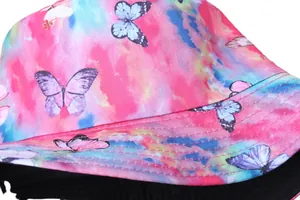 Reversible tie-dye bucket hat with butterfly print in vibrant pink blue and yellow