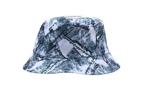 Close-up of reversible bucket hat with blue tie-dye patterns and stylish script printing