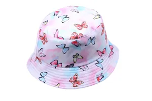 Detail shot of tie-dye bucket hat featuring colorful butterfly prints on canvas fabric