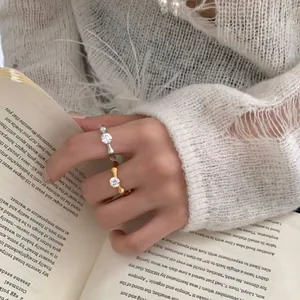 Set of two S925 sterling silver bamboo style rings in gold and silver with zircon