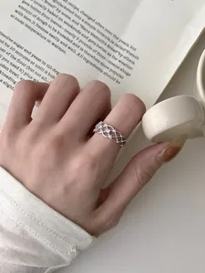 Detailed close-up of S925 sterling silver lace ring with micro-pave white zircons