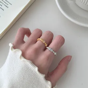 Anelli S925 bicolore argento e oro con finitura spazzolata e pavé di cristalli