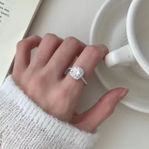 Classic S925 sterling silver square halo ring with moissanite and pave band detail