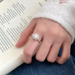S925 sterling silver ring featuring a radiant square-cut moissanite halo on a finger