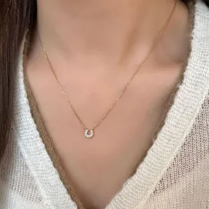Elegant gold S925 sterling silver U-shaped horseshoe necklace with sparkling zircons
