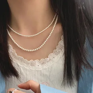 Elegant double-layer S925 sterling silver pearl necklace with round lustrous beads