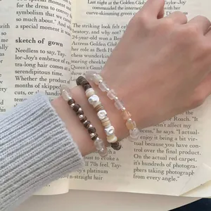 Set di tre braccialetti in argento S925 con perle di conchiglia e pietre preziose
