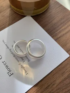 Macro detail of S925 sterling silver matte rings with S925 hallmark on inner band