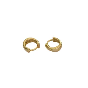 Minimalist S925 sterling silver hoop earrings with a polished golden finish for women