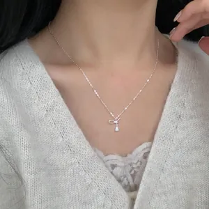 S925 sterling silver bow necklace with a pear-cut cubic zirconia pendant for women