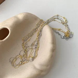 Minimalistische S925 Sterling Silber Perlenkette in Gold- und Silberoptik-Lagen