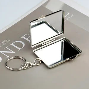 Mini rectangular metal folding makeup mirror keychain with polished silver finish