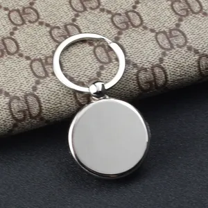 Porte-clés rond en métal argenté poli avec pendentif vierge pour gravure laser et DIY