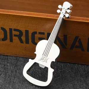 Macro detail of silver guitar-shaped metal bottle opener showing refined musical design