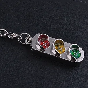 Portachiavi semaforo in metallo argento lucido con brillantini rossi gialli verdi