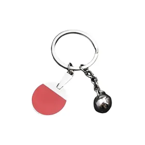 Table tennis keychain with red mini racket and silver metal ball on a silver keyring