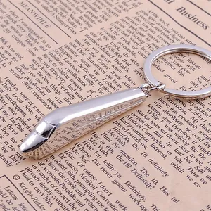 Polished silver zinc alloy train model keychain with sleek streamlined metallic design
