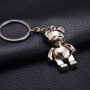 Polished silver metal teddy bear keychain with 3D mechanical bear pendant on black leather