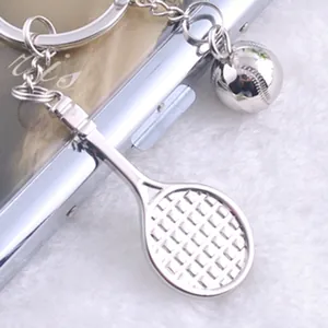 Creative silver tennis racket keychain and mini ball pendant accessory for sports fans