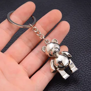Polished silver metal teddy bear keychain with articulated 3D design for car keys