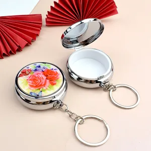 Boîte à bijoux et pilules portable en métal avec motif floral et porte-clés miroir
