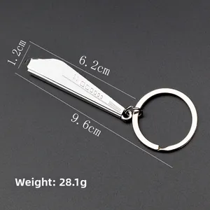 Detailed view of silver zinc alloy train keychain with size dimensions and 28.1g weight