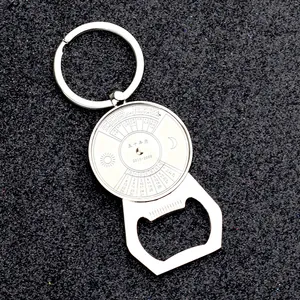 Detail of metal perpetual calendar keychain with bottle opener and engraved 50-year dial