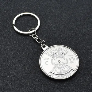 Metal 50-year perpetual calendar keychain with rotating sun and moon engraved dial