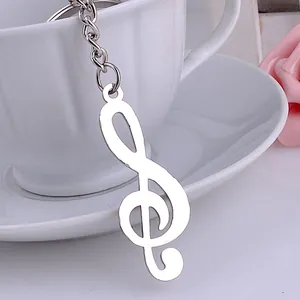 Portachiavi con nota musicale chiave di violino in argento lucido con anello in metallo
