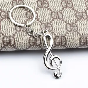 Portachiavi con nota musicale a chiave di violino in metallo argento lucido
