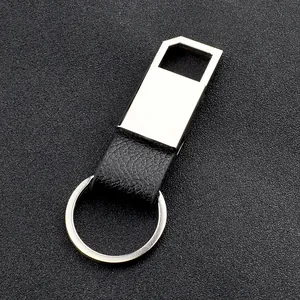 Detailed view of polished silver metal and black lychee leather business keychain
