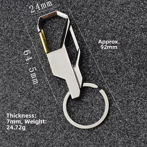 Detailed view of silver and gold metal car keychain with precise dimensions and weight