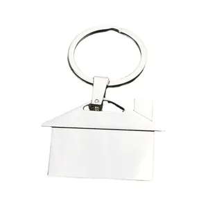 Minimalist silver metal house keychain in polished stainless steel with round ring holder