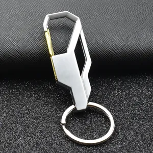 Polished silver zinc alloy car keychain with gold spring clip on black textured leather