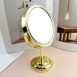Espejo de mesa giratorio de metal dorado con base redonda estable para tocador