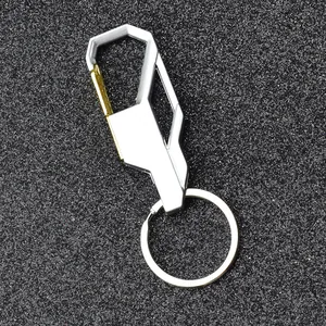 Sleek car shaped metal keychain in silver and gold finish with premium belt clip