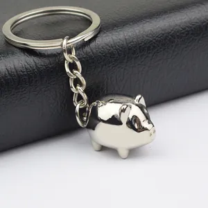 Porte-clés cochon en argent poli avec anneau métallique brillant pour sacs