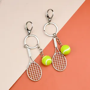 Set di portachiavi a forma di racchetta e pallina da tennis con finitura in metallo argento
