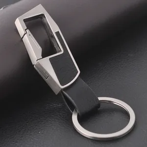 Macro detail of industrial style zinc alloy motorcycle keychain with black leather inlay