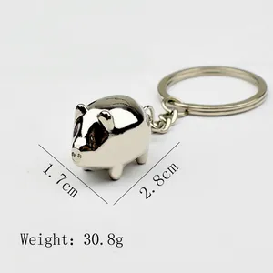 Porte-clés cochon en métal poli argenté, dimensions 2,8 x 1,7 cm, poids 30,8g