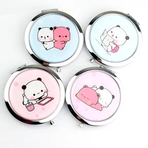 Close-up of portable metal makeup mirrors featuring cute Peach & Goma cartoon patterns