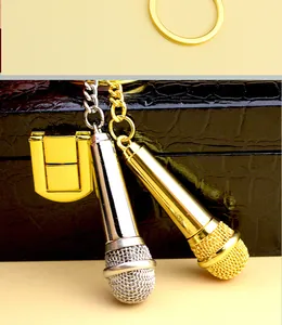 Detail shot of gold and silver microphone keychains with metallic mesh texture