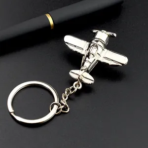 Porte-clés avion en métal poli avec modèle d'avion de chasse rétro et stylo élégant
