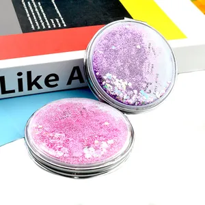 Double-sided folding makeup mirror with pink and purple quicksand glitter design