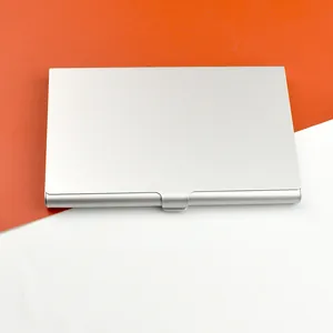 Macro detail of slim silver aluminum business card case with functional bottom groove