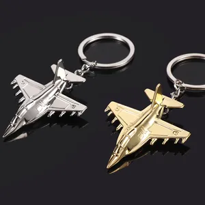 Polished alloy fighter jet keychains in gold and silver finish with metallic mirror texture
