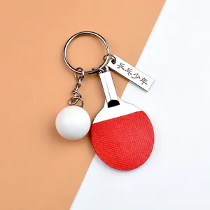 Miniature table tennis racket keychain with ball and engraved silver metal tag charm