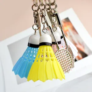 Close-up of colorful mini badminton shuttles and rackets as creative sports keychains